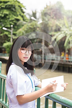 Woman Asian doctorÃÂ  White Shirt suit with stethoscope outdoor H photo